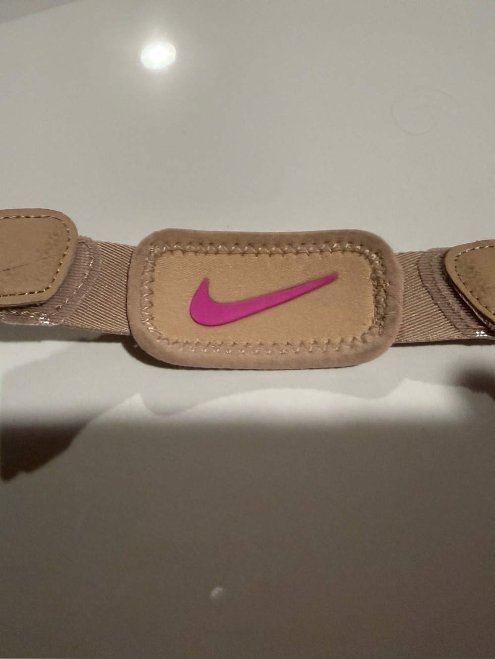 Nike Women's Tan Strap with Pink Swoosh